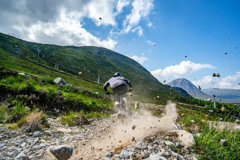 Mountain biker descending a technical path